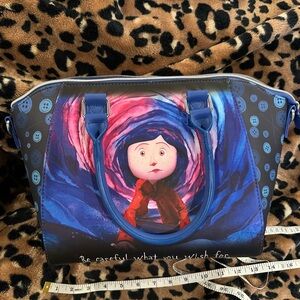 Loungefly Coraline purse. New without tags.